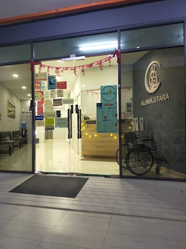 Clinic glass entrance at night
