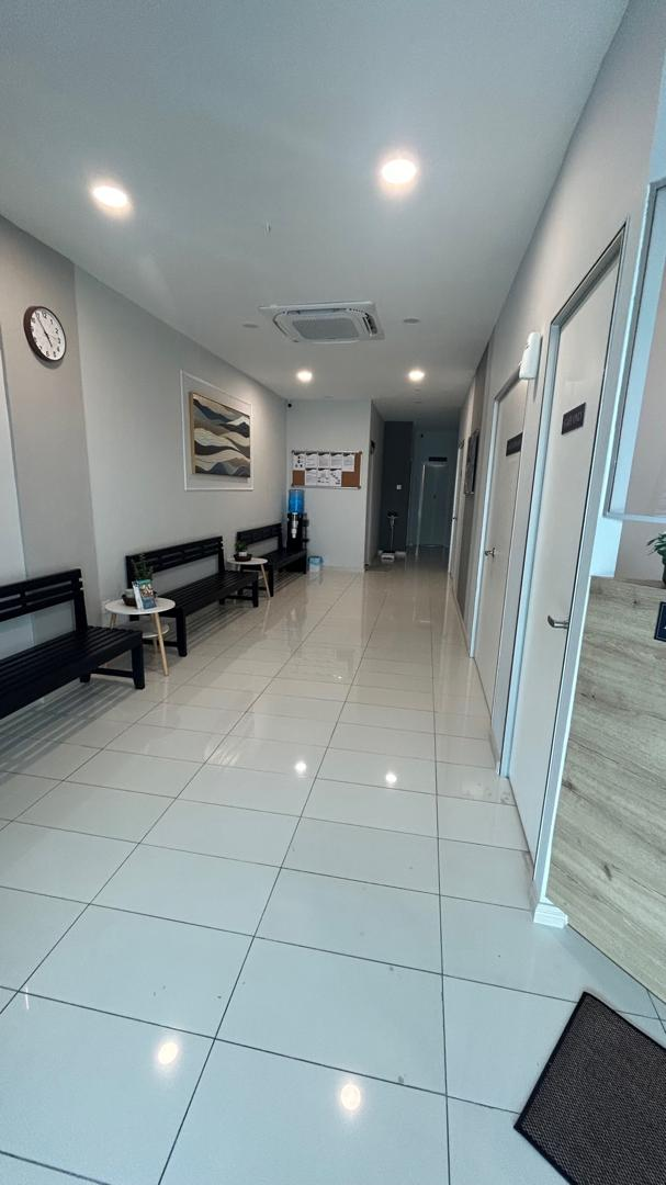 Clinic hallway with patient seating